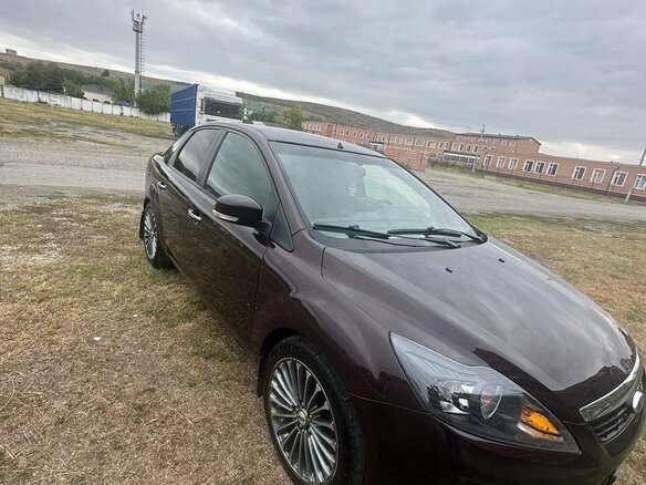 2009 Ford Focus II Рестайлинг, фиолетовый, 670000 рублей - вид 2