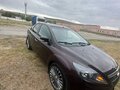 2009 Ford Focus II Рестайлинг, фиолетовый, 670000 рублей - вид 2