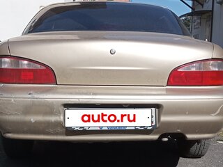 1997 Kia Clarus I, бежевый, 140000 рублей, вид 4
