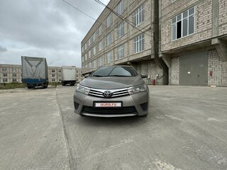 2013 Toyota Corolla XI (E160, E170, E180), серебристый, 1290000 рублей, вид 1