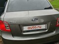 2010 Kia Rio II Рестайлинг, серебристый - вид 2