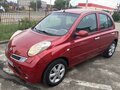 2010 Nissan Micra III (K12), пурпурный
