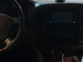 1999 Toyota Land Cruiser Cygnus 100 Series, серый, 1200000 рублей, вид 4