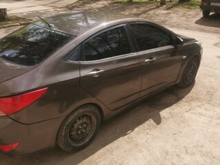 2016 Hyundai Solaris I Рестайлинг, коричневый, 650000 рублей, вид 4