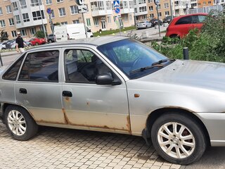 2009 Daewoo Nexia I Рестайлинг, серебристый, 149000 рублей, вид 2