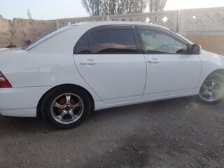 2002 Toyota Corolla IX (E120, E130), белый, 570000 рублей, вид 2