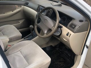 2001 Toyota Corolla IX (E120, E130), белый, 420000 рублей, вид 3