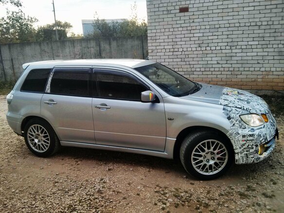 2003 Mitsubishi Airtrek I, серебристый - вид 8