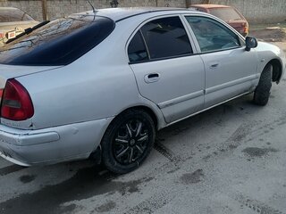 1999 Mitsubishi Carisma I Рестайлинг, серый, 170000 рублей, вид 2