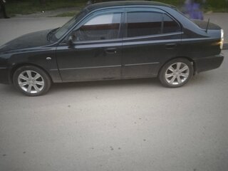2011 Hyundai Accent ТагАЗ II, чёрный, 700000 рублей, вид 2