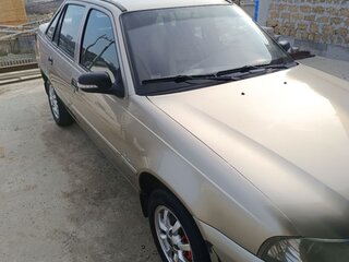 2013 Daewoo Nexia I Рестайлинг, бежевый, 600000 рублей, вид 4