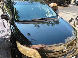 2009 Toyota Corolla X (E140, E150), чёрный, 650000 рублей, вид 1