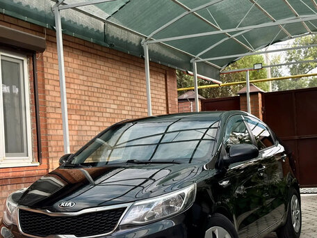 2015 Kia Rio III Рестайлинг, чёрный, 1150000 рублей, вид 2