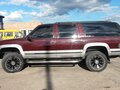1995 GMC Suburban, пурпурный - вид 10