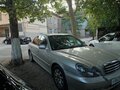 2007 Hyundai Sonata ТагАЗ IV (EF) Рестайлинг, серебристый - вид 2