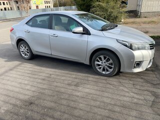 2013 Toyota Corolla XI (E160, E170, E180), серебристый, 1750000 рублей, вид 2