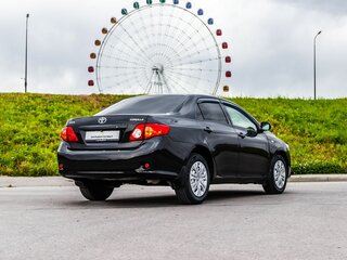 2008 Toyota Corolla X (E140, E150), чёрный, 750000 рублей, вид 2