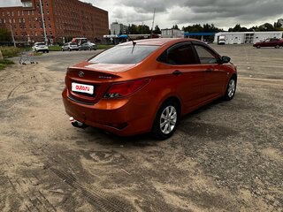 2015 Hyundai Solaris I Рестайлинг, оранжевый, 750000 рублей, вид 4