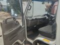 1996 Isuzu Elf (N-series), белый, 700000 рублей - вид 8