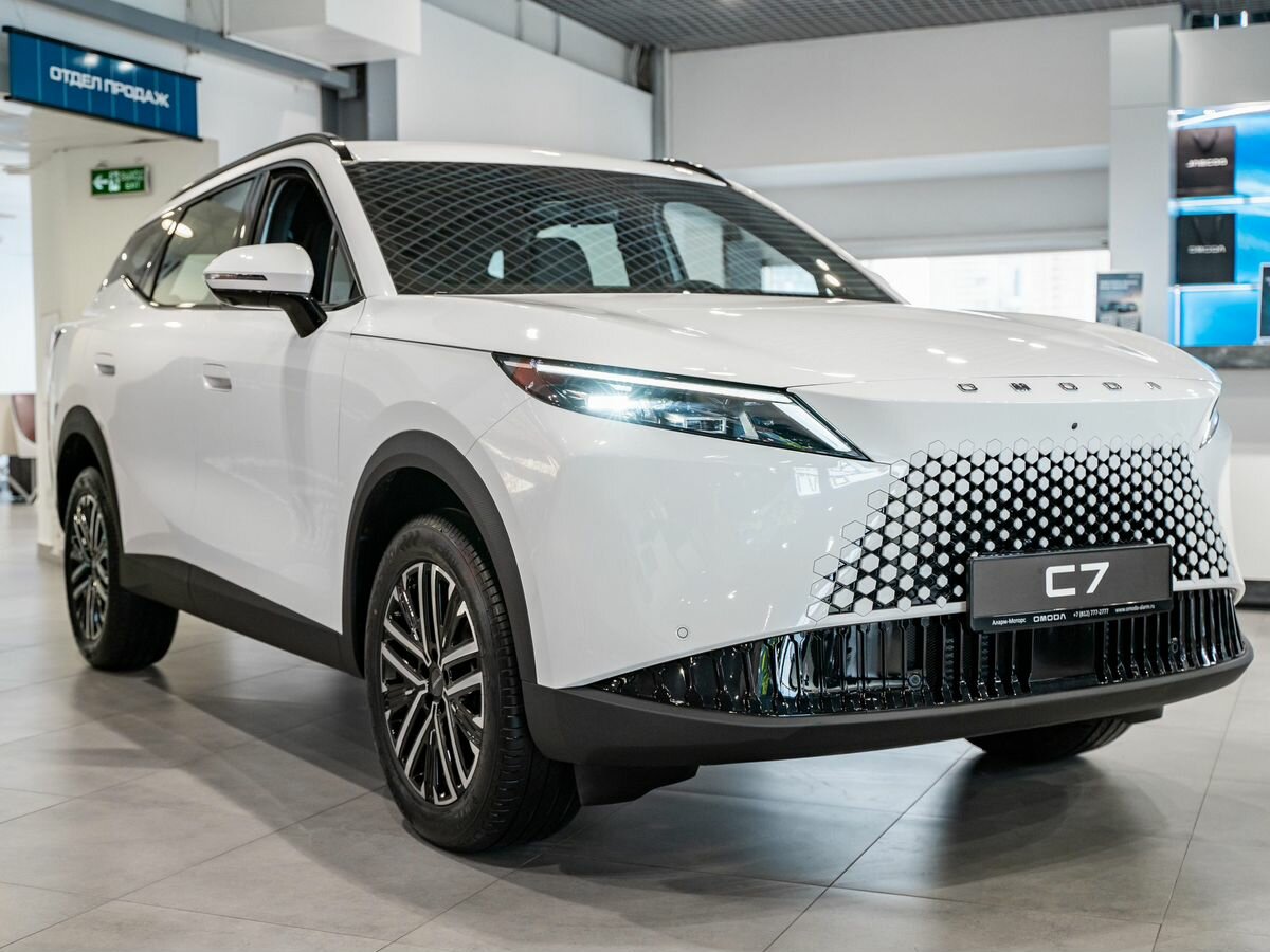 Открыть фотографии: Omoda C7