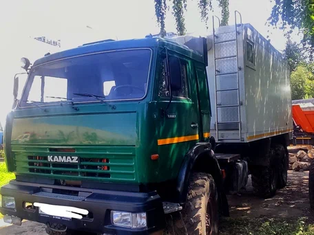 2009 КамАЗ 43118, зелёный, 2700000 рублей, вид 2