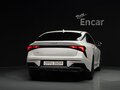 2025 Kia K5 III Рестайлинг, белый - вид 2