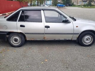 2006 Daewoo Nexia I, серебристый, 100000 рублей, вид 2