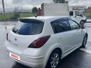 2010 Nissan Tiida I, белый, 670000 рублей, вид 4