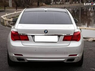 2010 BMW 7 серии Long 750Li xDrive V (F01/F02/F04), белый, 1890000 рублей, вид 5