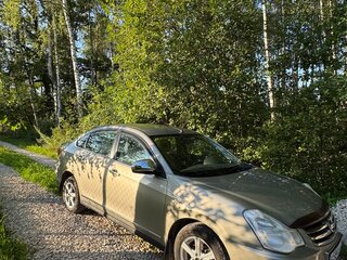 2013 Nissan Almera III (G15), бежевый, 900000 рублей, вид 1
