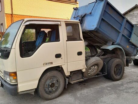 1995 Nissan Atlas, белый, 1750000 рублей, вид 4