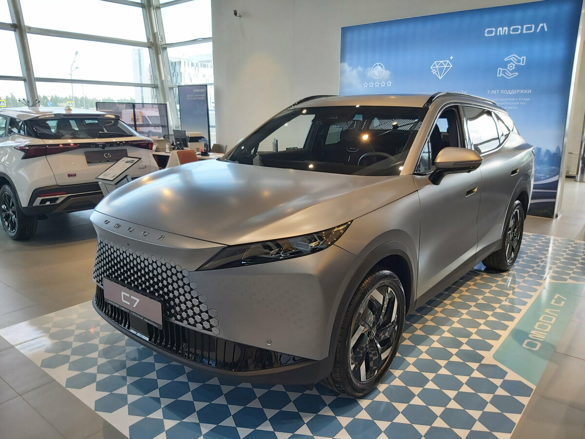 Открыть фотографии: Omoda C7