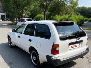1997 Toyota Corolla VII (E100), белый, 310000 рублей, вид 4