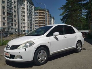 2009 Nissan Tiida I, белый, 610000 рублей, вид 1