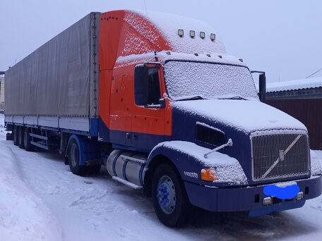 2002 Volvo VN, оранжевый, 1700000 рублей, вид 2
