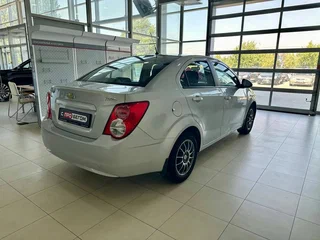 2013 Chevrolet Aveo II, серебристый, 729900 рублей, вид 5