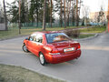 2009 Mitsubishi Lancer Classic IX Рестайлинг, красный - вид 1