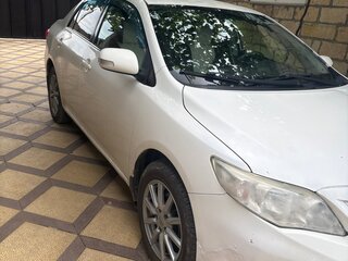 2011 Toyota Corolla X (E140, E150) Рестайлинг, белый, 600000 рублей, вид 5