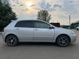 2002 Toyota Corolla Runx IX (E120, E130), белый, 605000 рублей, вид 1
