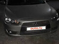 2009 Mitsubishi Lancer X, золотистый - вид 1
