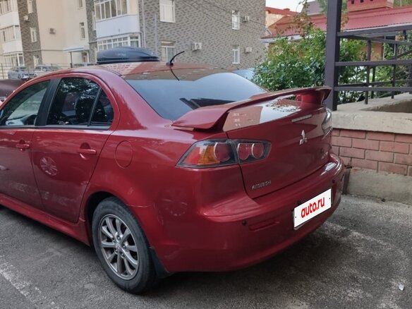2012 Mitsubishi Lancer X Рестайлинг, пурпурный, 1200000 рублей - вид 4
