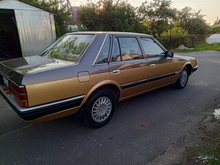 1987 Nissan Laurel V (C32), коричневый, 1100000 рублей, вид 4