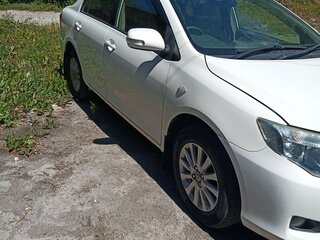 2008 Toyota Corolla Axio X (E140, E150), белый, 699000 рублей, вид 3
