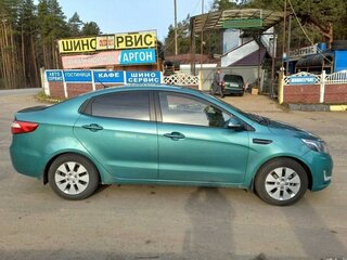 2011 Kia Rio 5-speed III, зелёный, 950000 рублей, вид 4