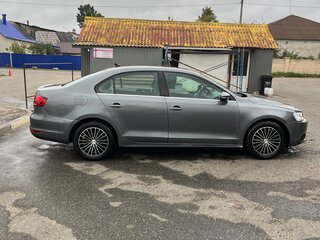 2014 Volkswagen Jetta VI, серебристый, 820000 рублей, вид 3