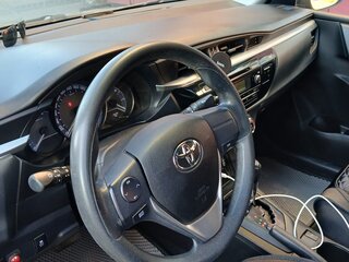 2014 Toyota Corolla XI (E160, E170, E180), серый, 1500000 рублей, вид 4