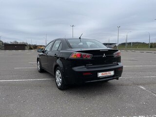 2010 Mitsubishi Lancer X, чёрный, 730000 рублей, вид 2