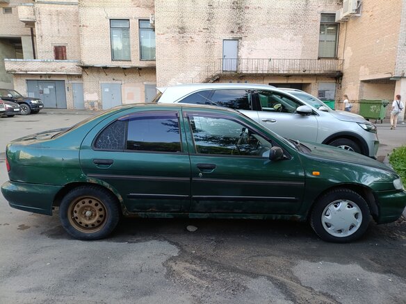 1997 Nissan Almera I (N15), зелёный - вид 1