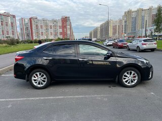 2014 Toyota Corolla XI (E160, E170, E180), чёрный, 920000 рублей, вид 4