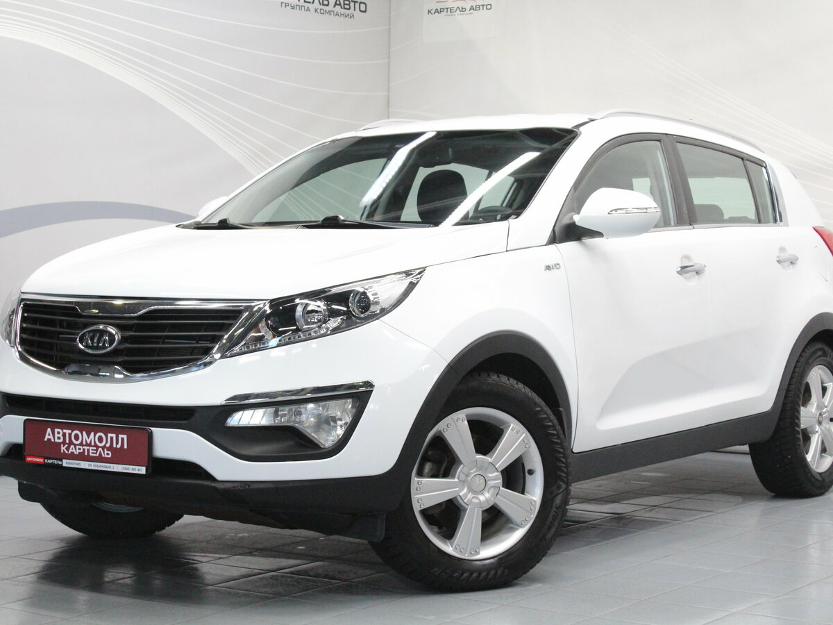 Открыть фотографии: Kia Sportage III